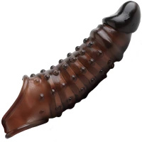 NAKŁADKA NA PENISA Z DWUSTRONNYMI WYPUSTKAMI USZTYWNIA PRZEDŁUŻA STOSUNEK